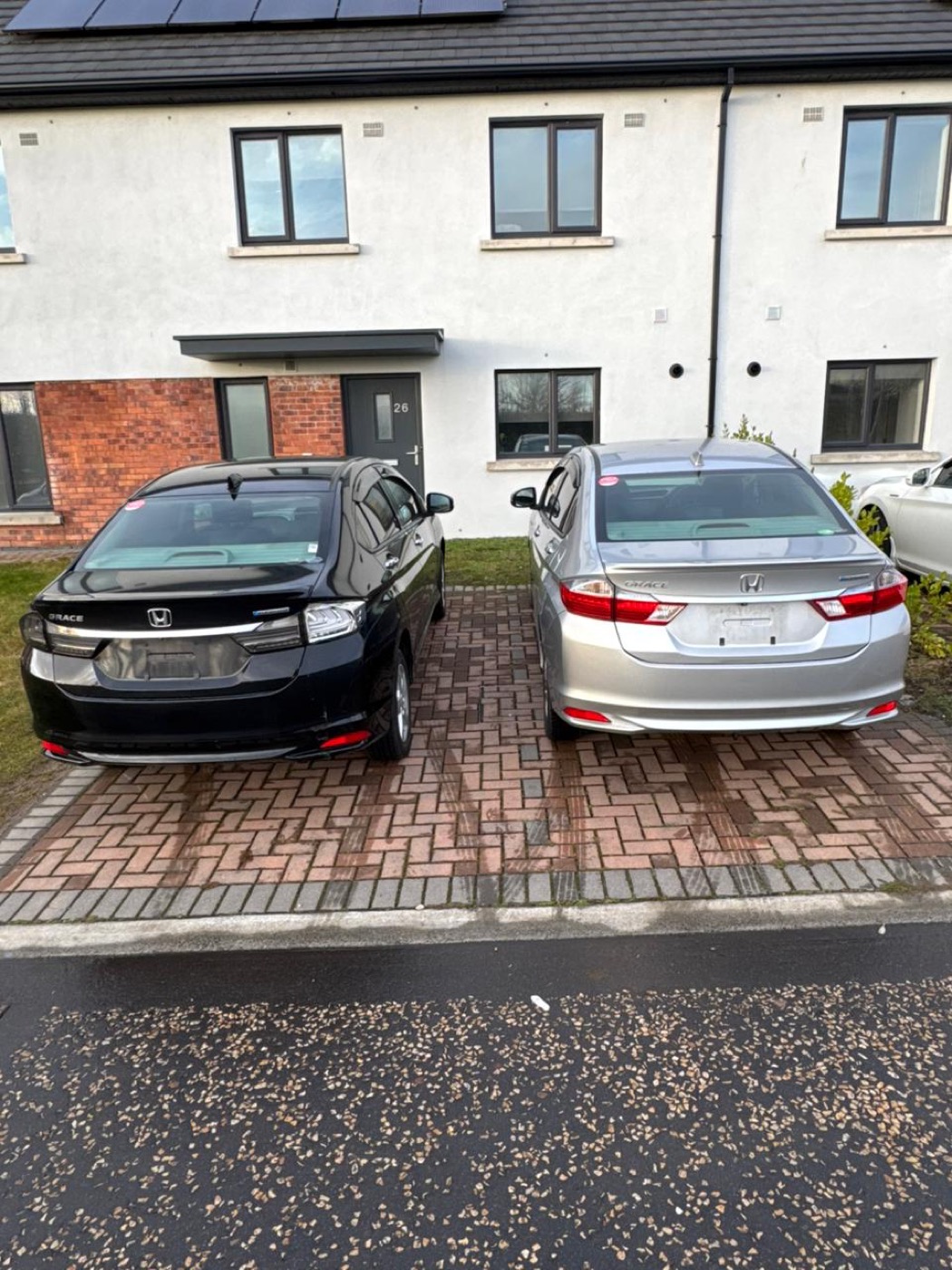 Two Honda Grace hybrids · home in Ireland