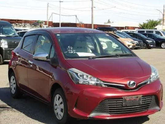 Red Toyota Vitz bought in Japan